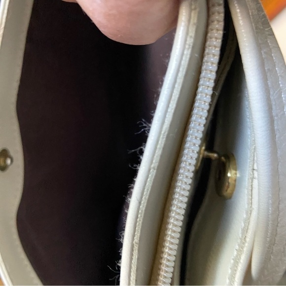 Leather shoulder handbag has 5 compartments that zip or snap for easy access. - Picture 6 of 8